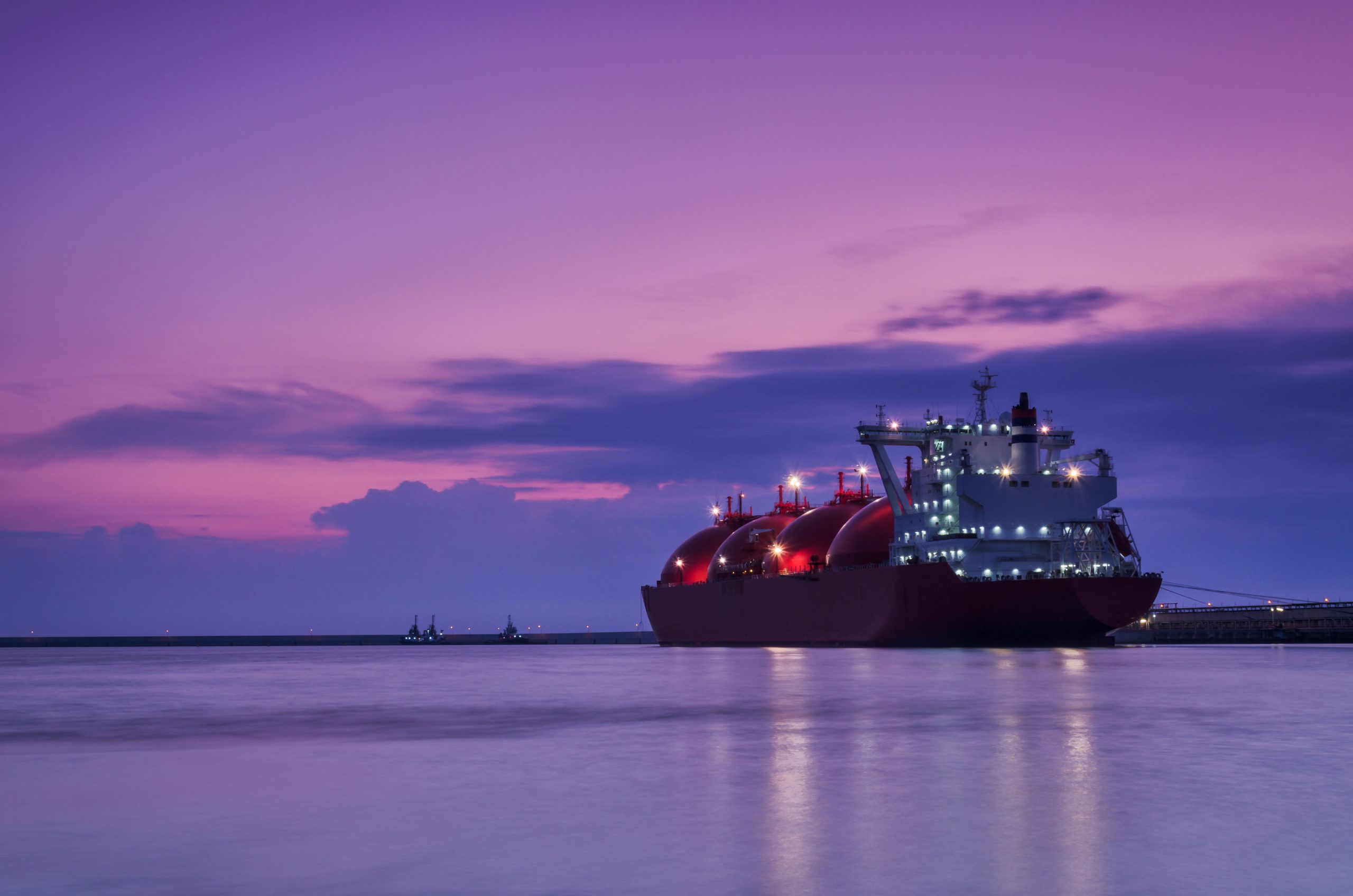 Lng,Tanker,-,Ship,At,Dawn,Moored,To,The,Gas